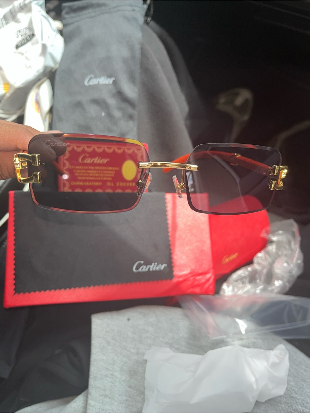 Cartier Gold Frame Sunglasses with Red Gradient Lenses